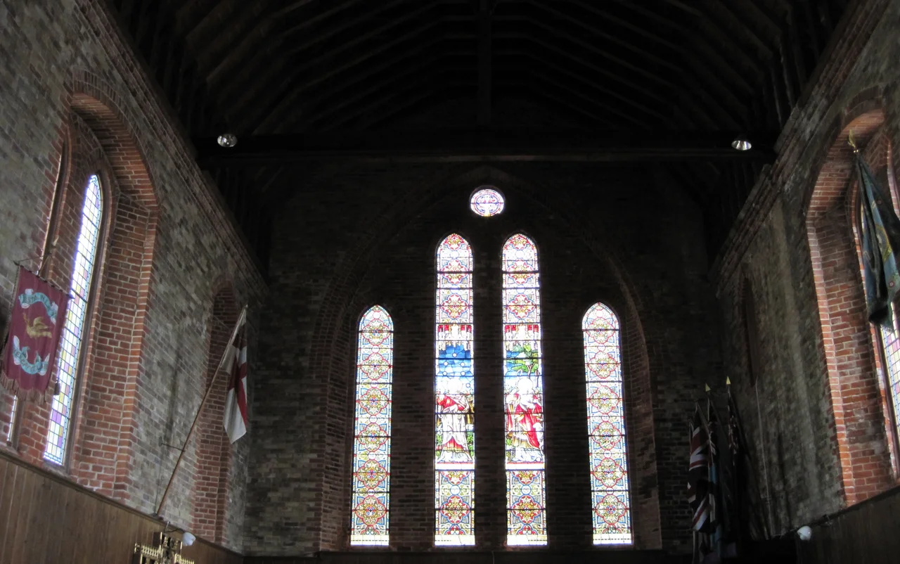 The stained glass windows and flags in the Falkland Islands Cathedral