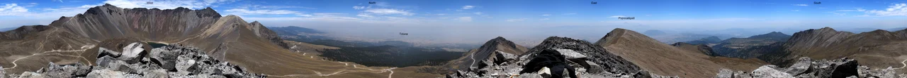 360° panoramic view from crater rim of Nevado Toluca, 120 km to the east the Popocatépetl rises out of the clouds
