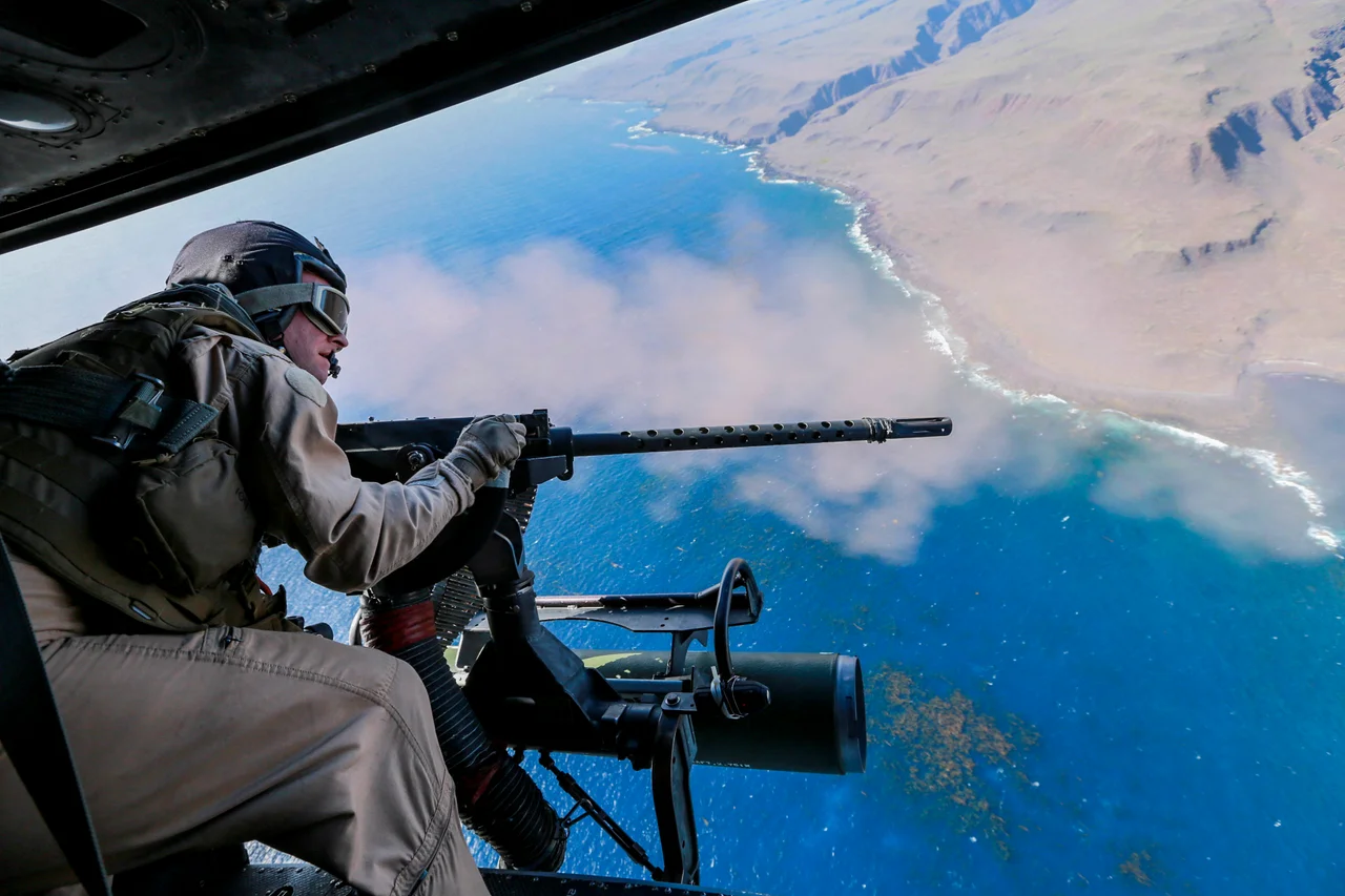 A  Marine engages targets from a UH-1Y Venom with Marine Medium Tiltrotor Squadron 161, 15th Marine Expeditionary Unit, during Composite Training Unit Exercise (COMPTUEX) above San Clemente Island, California, March 20, 2015. COMPTUEX gives the Marines of VMM-161 the opportunity to practice real-world scenarios and hone their skill sets.

(U.S. Marine Corps photo by Sgt. Jamean Berry/Released)