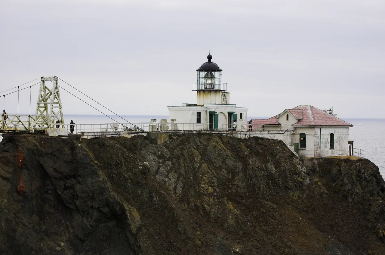 Point Bonita Light.  The end of the suspension bridge, which provides access to the lighthouse, is visible on the left side of the photo.
Photo taken by me, Joshua Thompson.