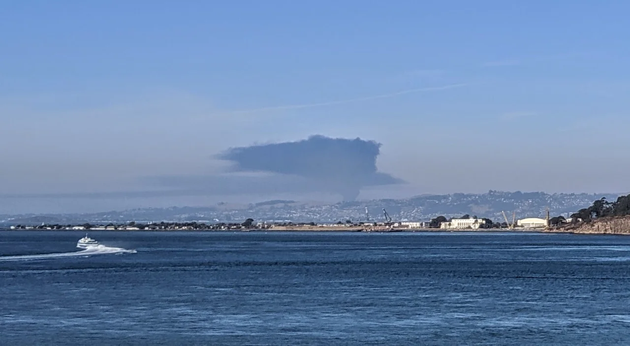 The Nustar Fire (Crockett, California) smoke plume from the 7th floor of 345 Spear Street, San Francisco, a few hours after the first started.