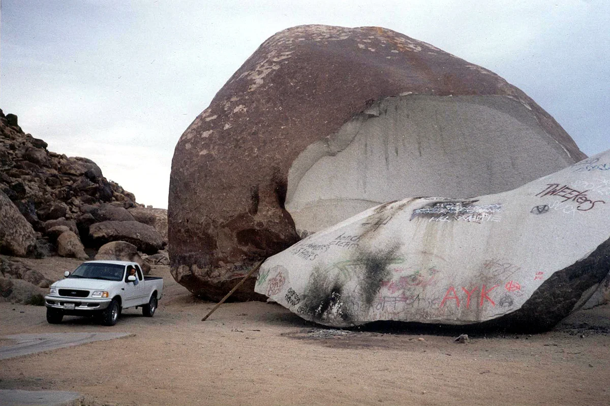 Self timer shot of a pickup truck next to Giant Rock in Landers Ca., to show size perspective.