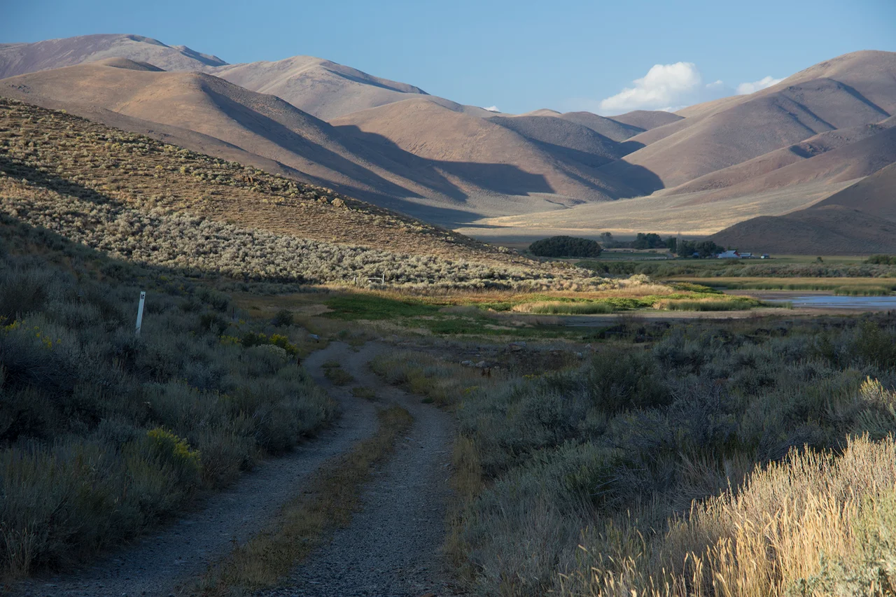 Goodale's Cutoff of the Oregon Trail at Lava Lake, west of Arco, ID and east of Carey, ID along US 26, 20, 93.   Picture of current two track along section of the cutoff of the Oregon Trail.
