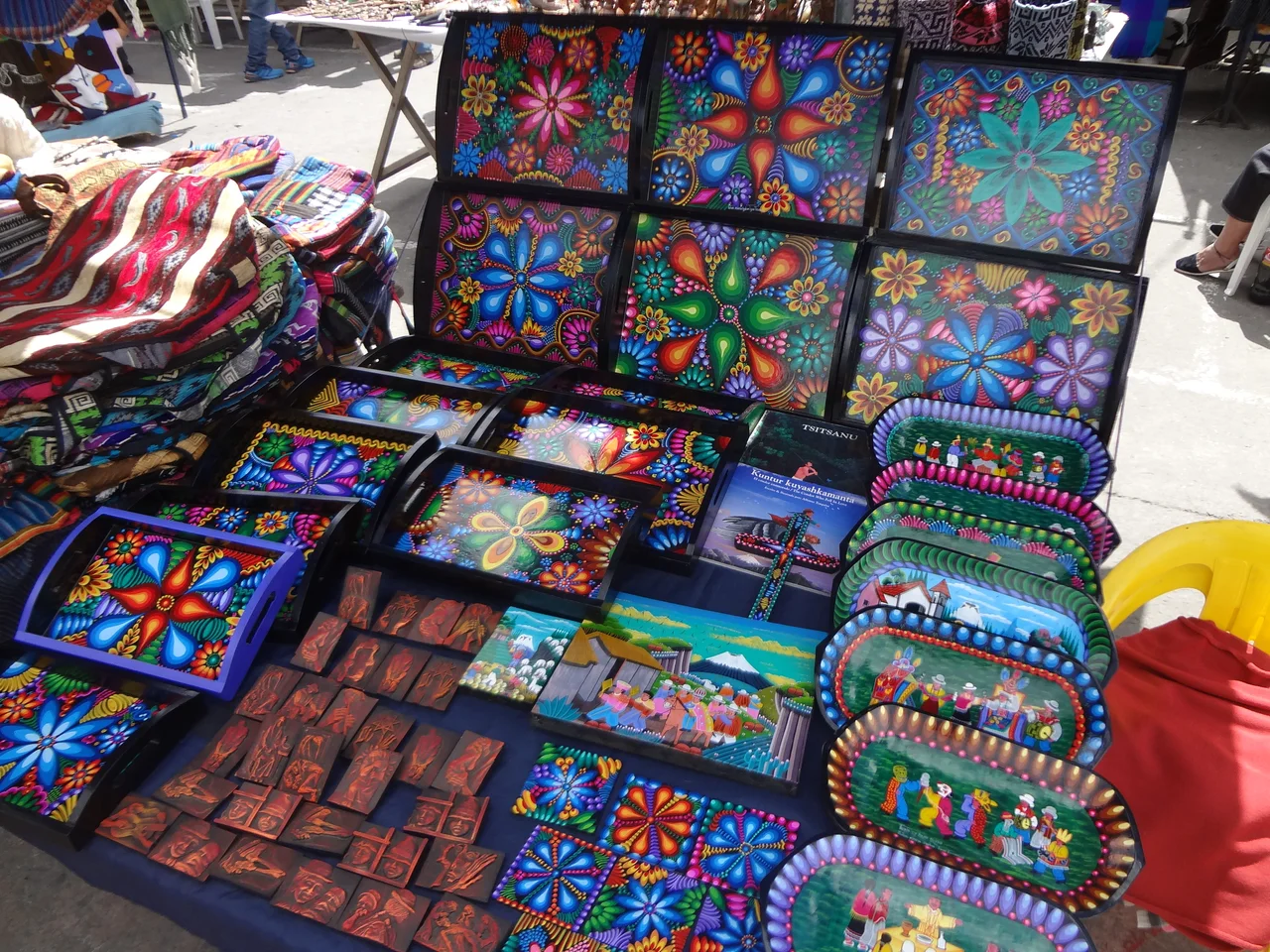 Hand painted by local artisans, Otavalo Market in the Andes Mountains
