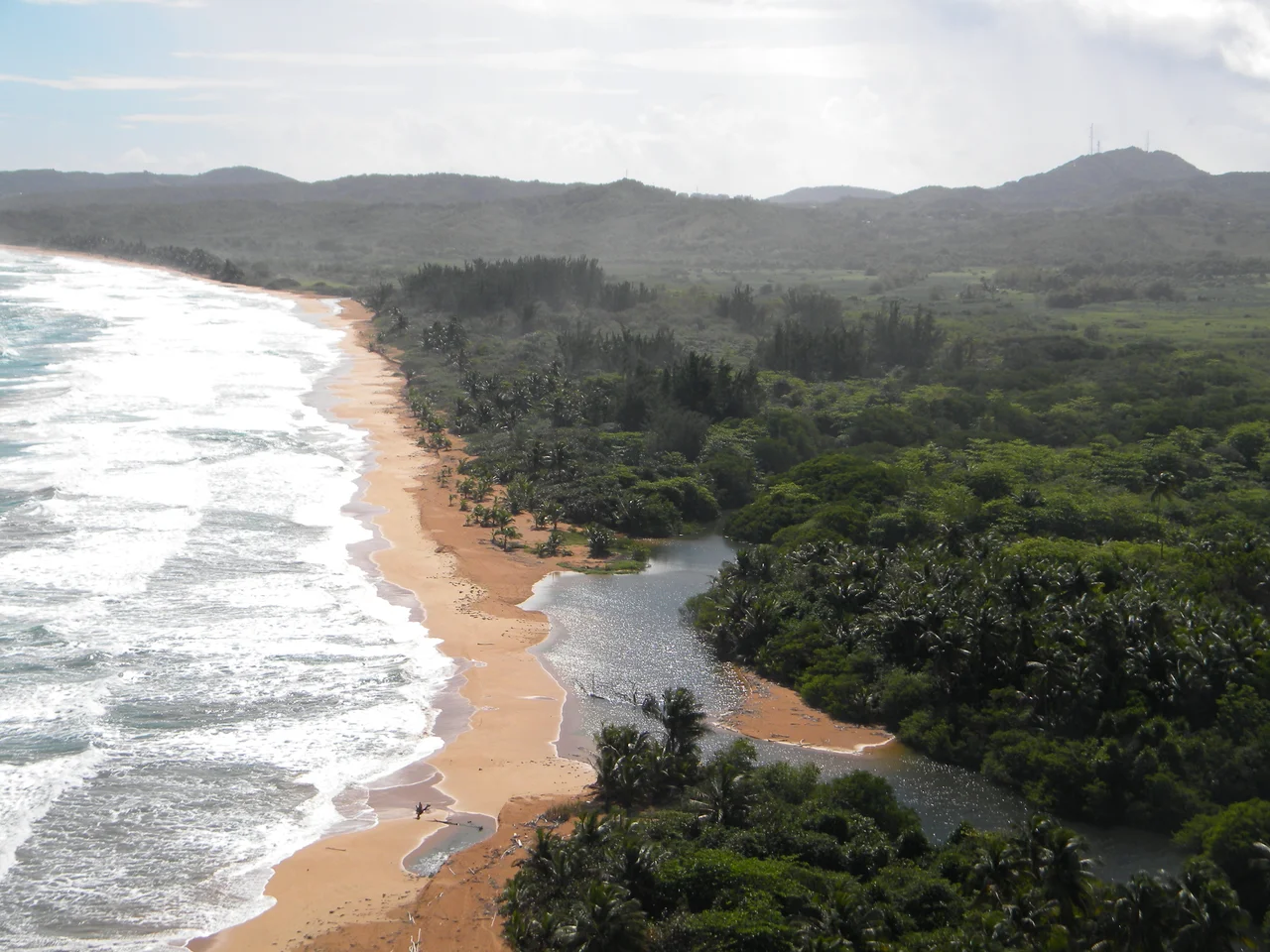 San Miguel Beach at the entrance of the Northeast Ecological Corridor.  Photo taken from the Sandy Hills Condominium roof.
