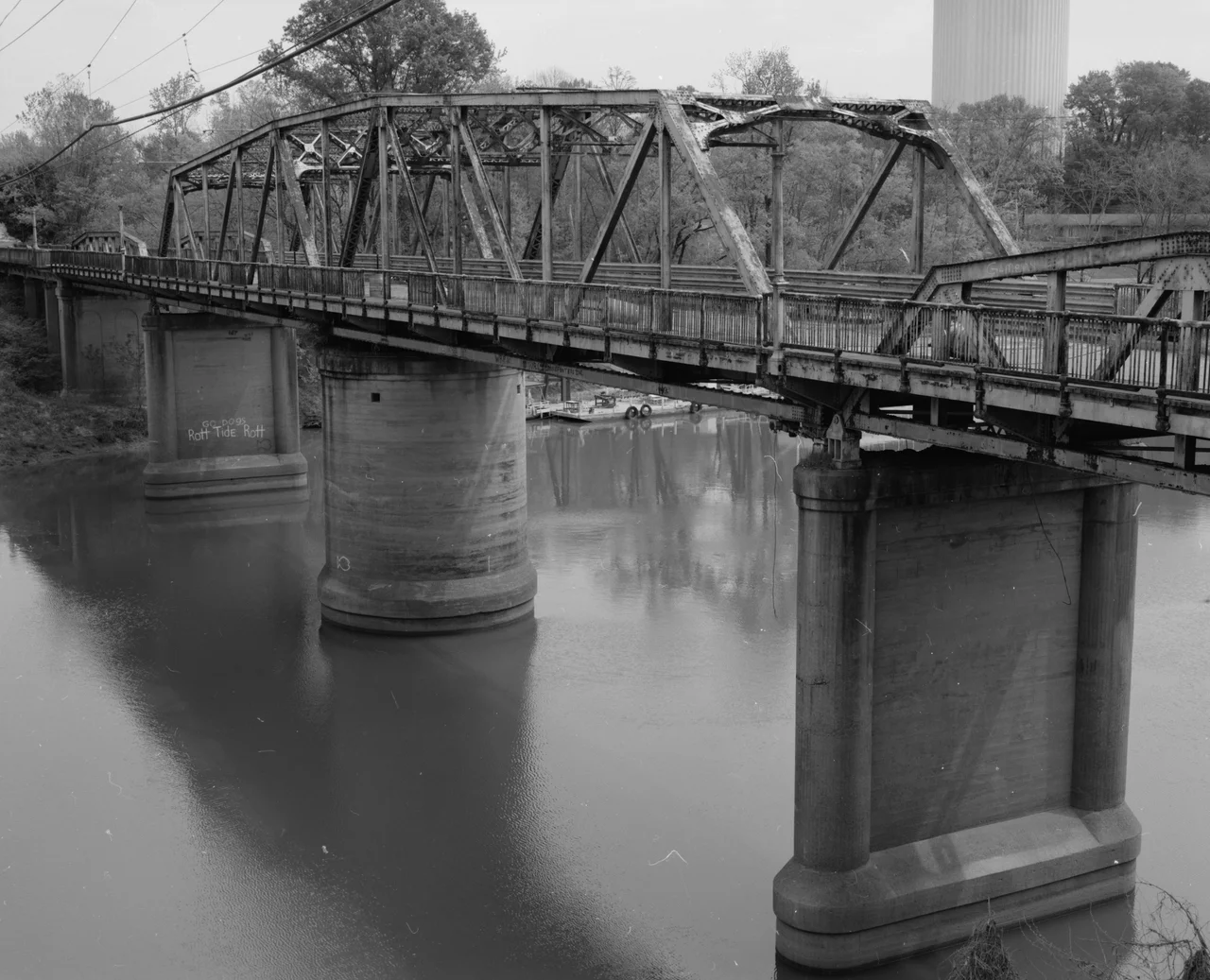 Southern (upstream) side of the Columbus Bridge, which once carried U.S. Route 82 over the Tombigbee River at Columbus, Mississippi, United States. Built in 1925, it is listed on the National Register of Historic Places.