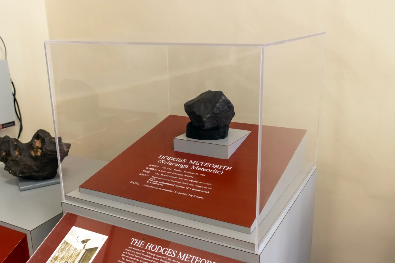 A photograph of the Hodges/Sylacauga meteorite in its display case at the Alabama Museum of Natural History taken on October 21st, 2024.