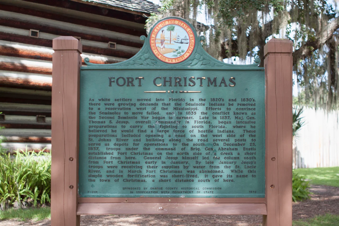 The historical marker located at the Fort Christmas Historical Park describing the history of Fort Christmas. The marker was set in place by the Orange County Historical Society and the Florida Department of State.