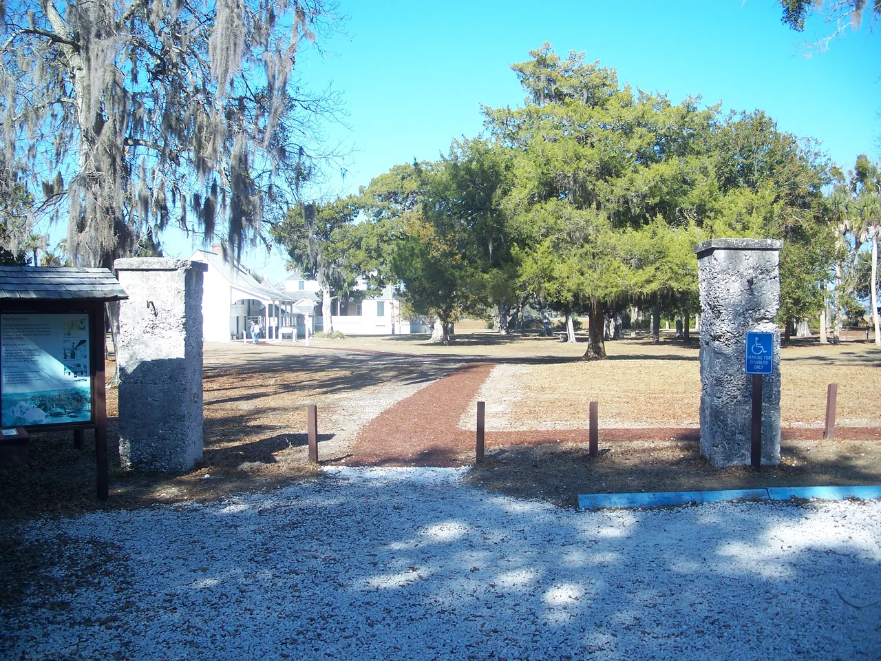 Duval County, Florida: Timucuan Ecological and Historic Preserve: Kingsley Plantation: Entrance to the plantation house area. This is the modern entrance, leading to the kitchen house and the rear of the main house. The front of the main house, and its main entrance, face the river.