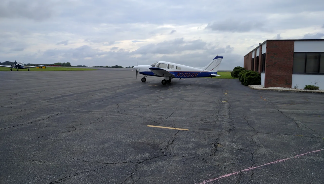 A Piper PA-28 parked at Smith Reynolds.