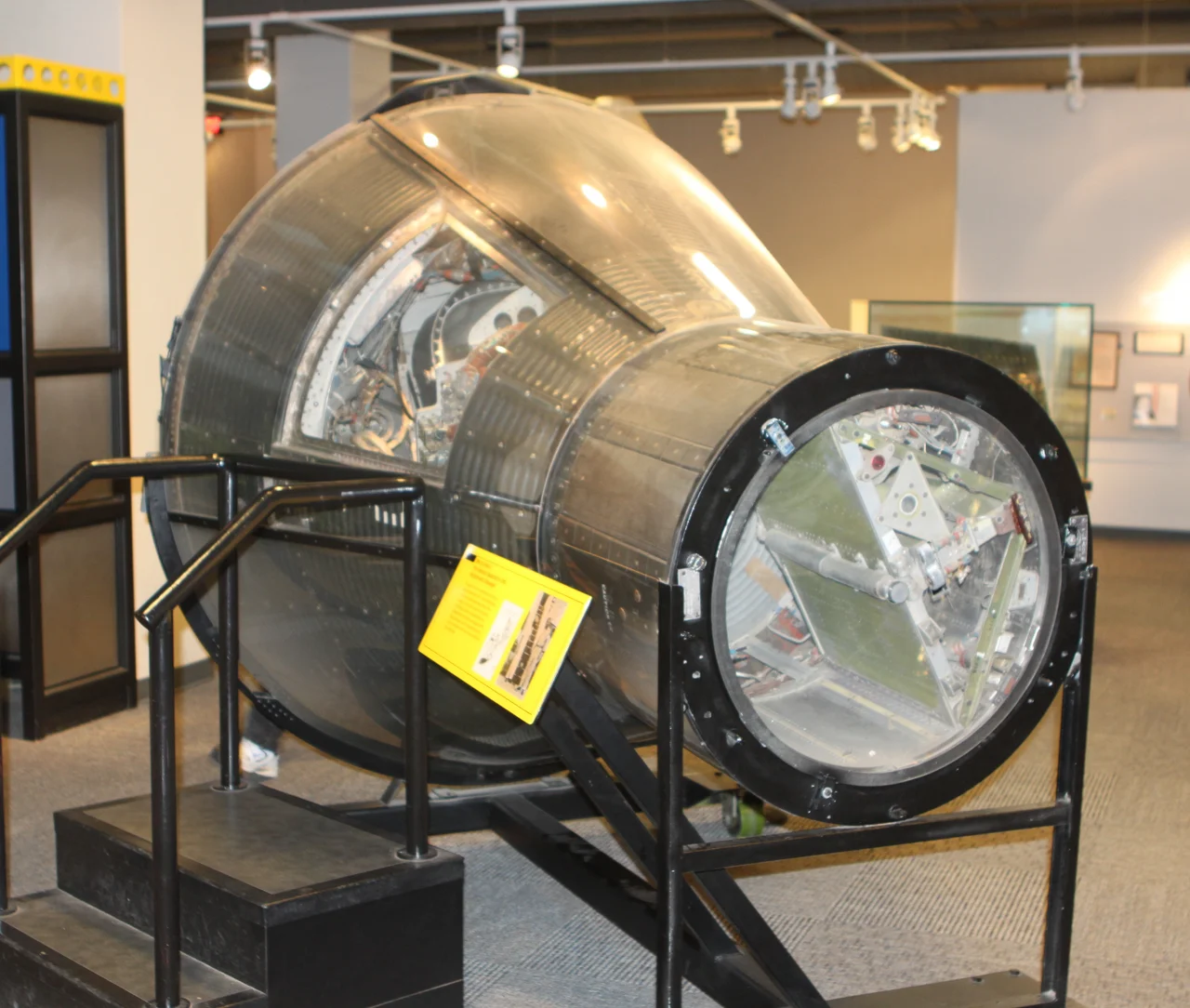 Mercury-Atlas 5 capsule held Enos, a chimpanzee, as he orbited the earth twice on November 29, 1961. This flight was the final test before John Glen's first U.S. orbiting human. Here the capsule is on display at the North Carolina Museum of Life and Science.