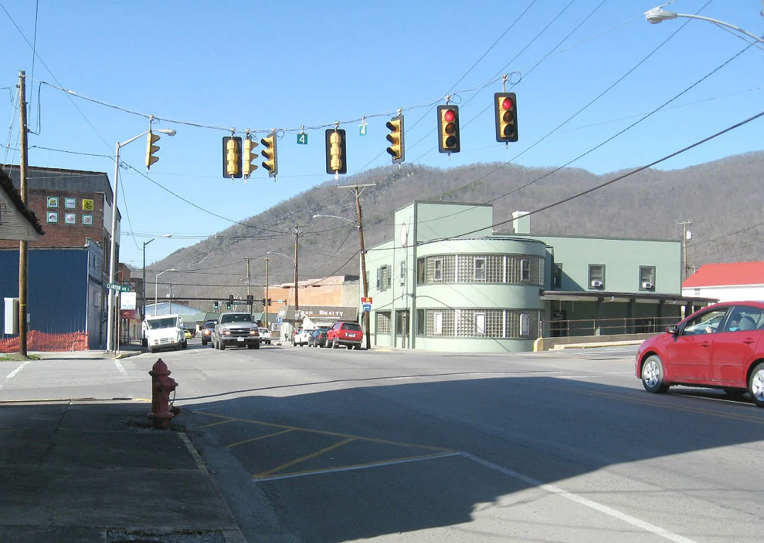 Main Street of Big Stone Gap, Virginia. Little Stone Mountain and the Big Stone Gap are visible in the background.