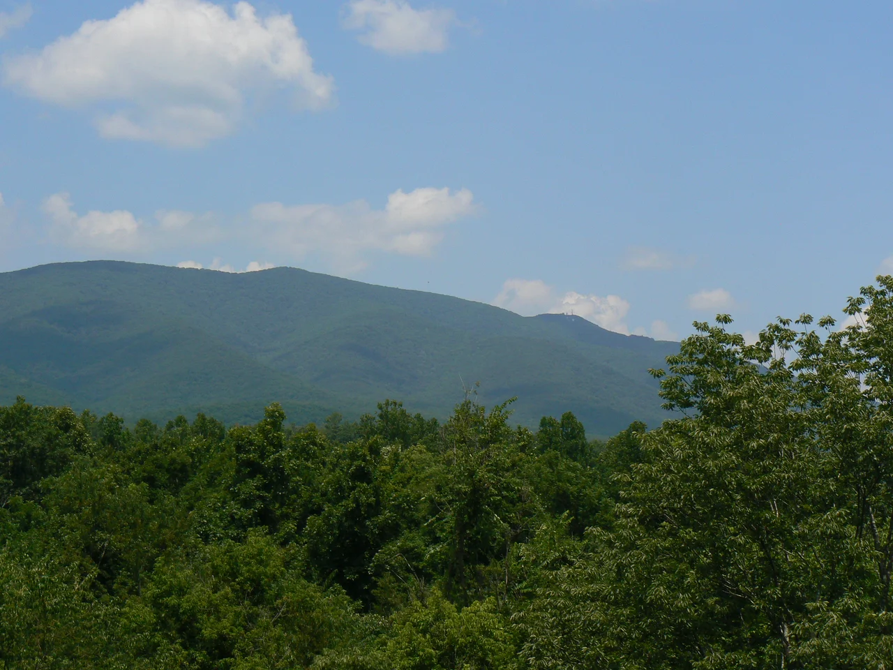 View towards west from Elliott Knob (4,463 feet (1,360 m)), the highest point in Augusta County, Virginia. Approximate coordinates image taken: N38°09′59″, W79°18′53″