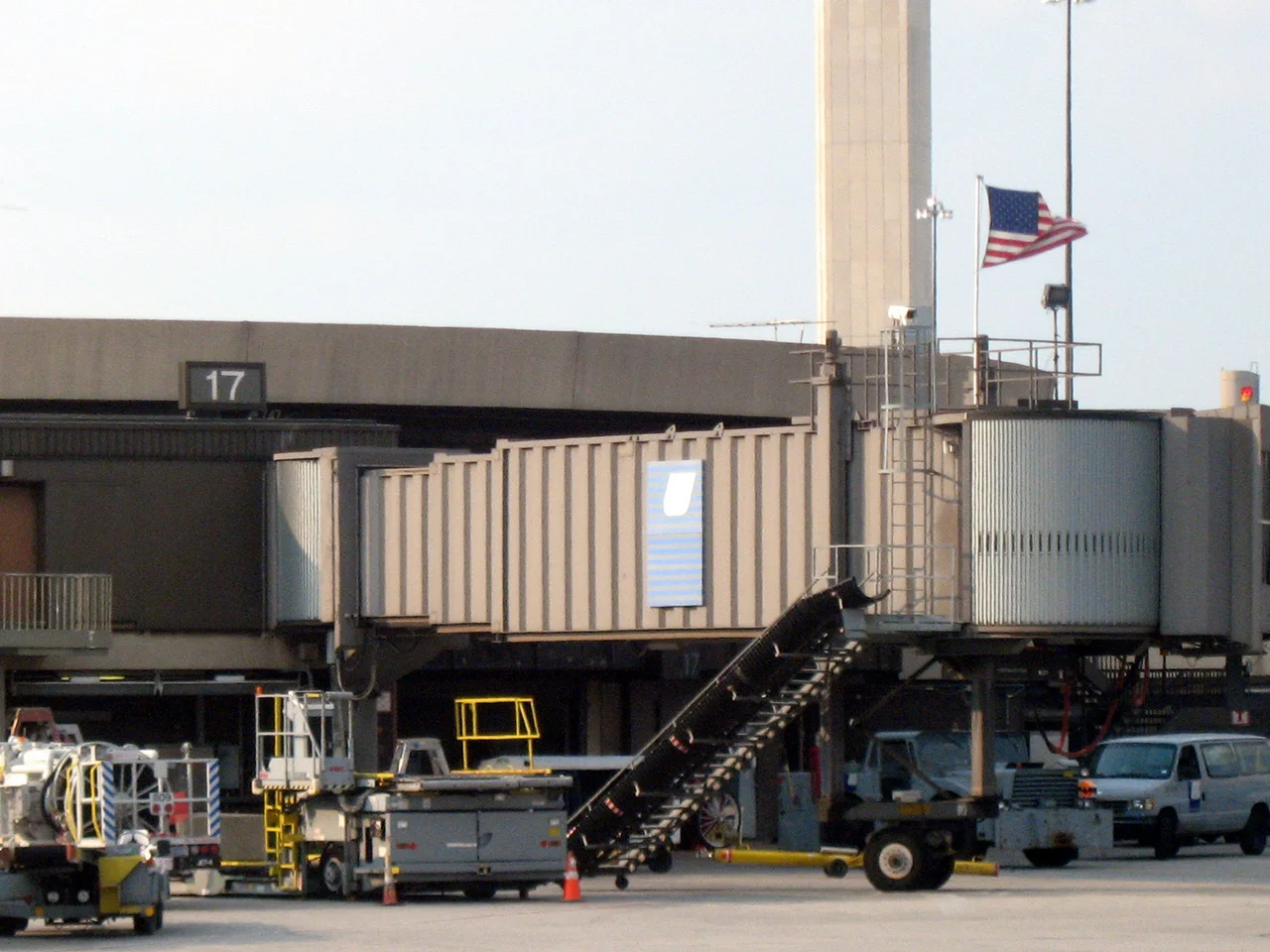 An American flag flies over Gate 17 of Terminal A at Newark Liberty International Airport. On September 11, 2001, United Airlines Flight 93 pushed back from the gate at 8:01 am, headed for San Francisco. Passengers learned about the coordinated attacks, and tried to overtake the airplane, resulting in the plane crashing into a field in Shanksville, Pennsylvania.