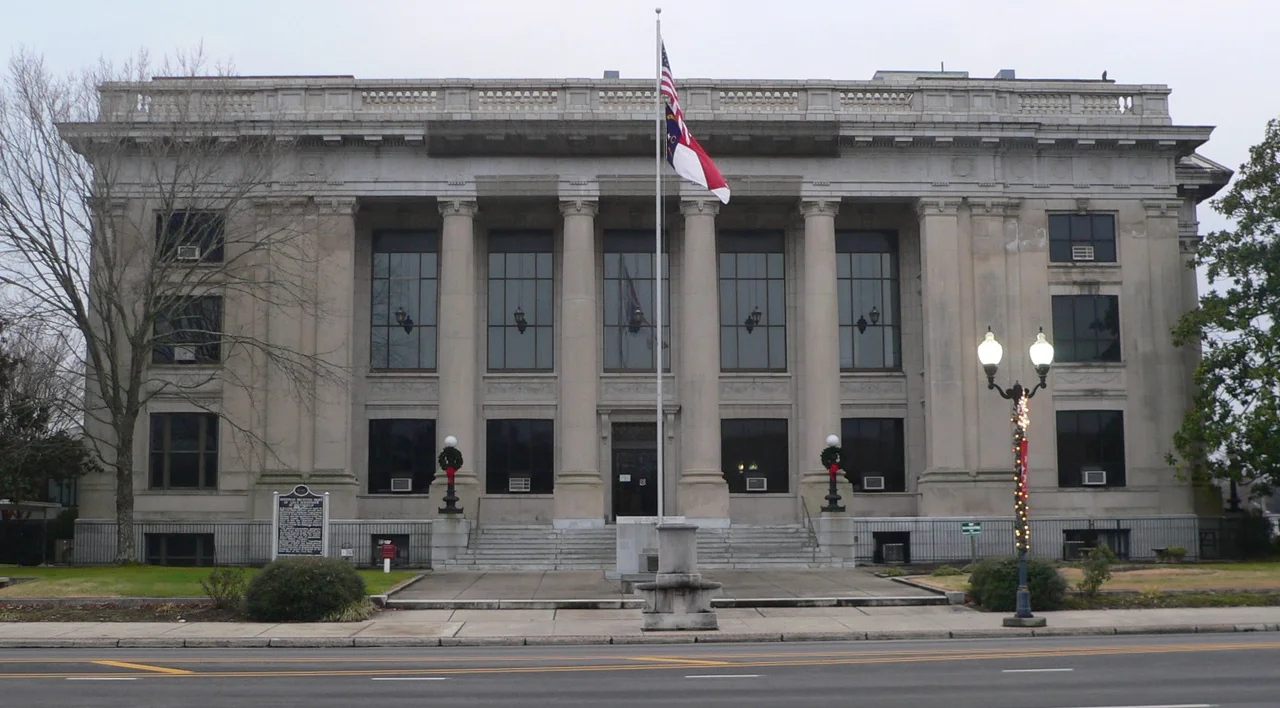 Johnston County courthouse, located at southeast corner of 2nd and Market Streets in Smithfield, North Carolina; seen from the northeast, across Market.