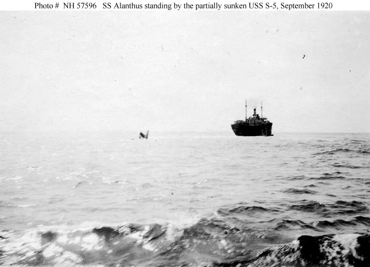 Steamship Alanthus standing by the submarine S-5 stern on 2 September 1920, the day after she accidentally sank off Delaware Bay. Photographed from USS McDougal (DD-54).