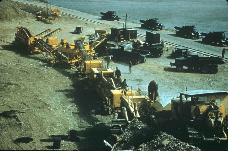 Construction equipment, rock crushing operations, along Hanson Highway, Ernest Harmon Air Force Base, Stephenville, Newfoundland, 347th EAB, US Army Corps of Engineers.