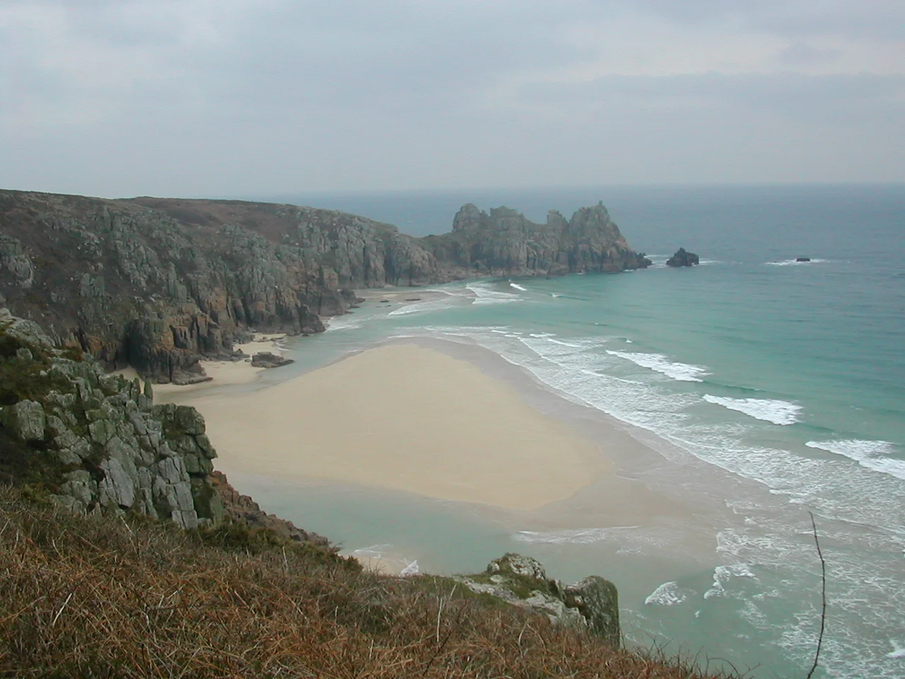 Treen beach, with the Logan Rock headland in the background, near Porthcurno, Cornwall, United Kingdom
Author Chris Ango

March 2006