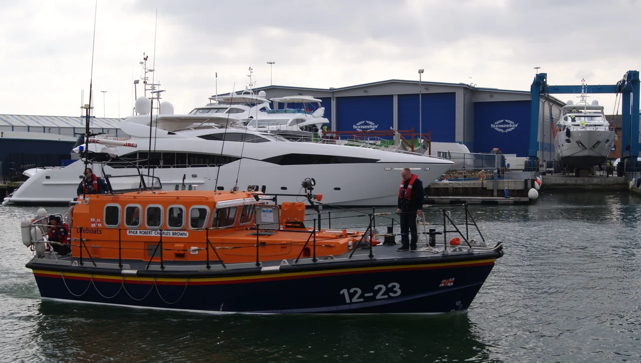 Swanage Lifeboat Swanage Lifeboat RNLB 'Robert Charles Brown' in Poole shipping channel about to go under the Lifting Bridge towards Hamworthy, perhaps on route to the RNLI HQ Poole for a service.