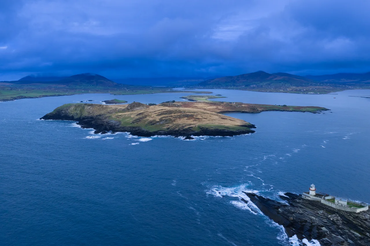 North-west aerial view of Beginish Island, with Valentia lighthouse visible
