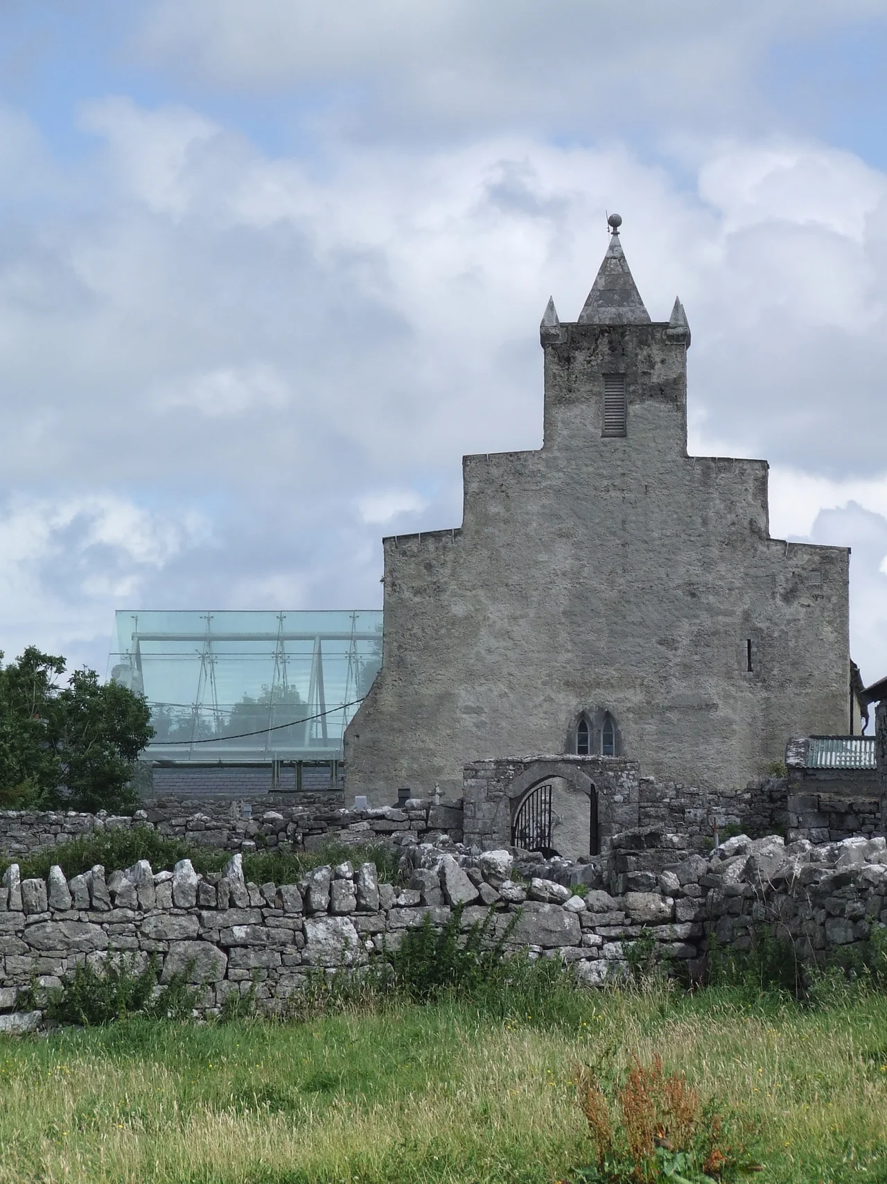 Cathedral church of the Diocese of Kilfenora. Northern transept, on left, shows glass roof installed in 2005 to conserve celtic crosses.