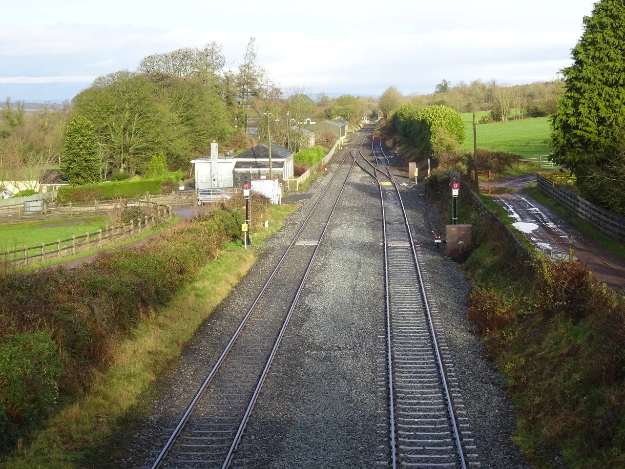 Ballyhale railway station (site), County KilkennyOpened in 1853 by the Waterford &amp; Kilkenny Railway on the line between those two places, it later became part of the Great Southern &amp; Western Railway. This station closed in 1963.
View north towards Thomastown &amp; Kilkenny. The building was still extant when this image was taken but the platform had been removed.