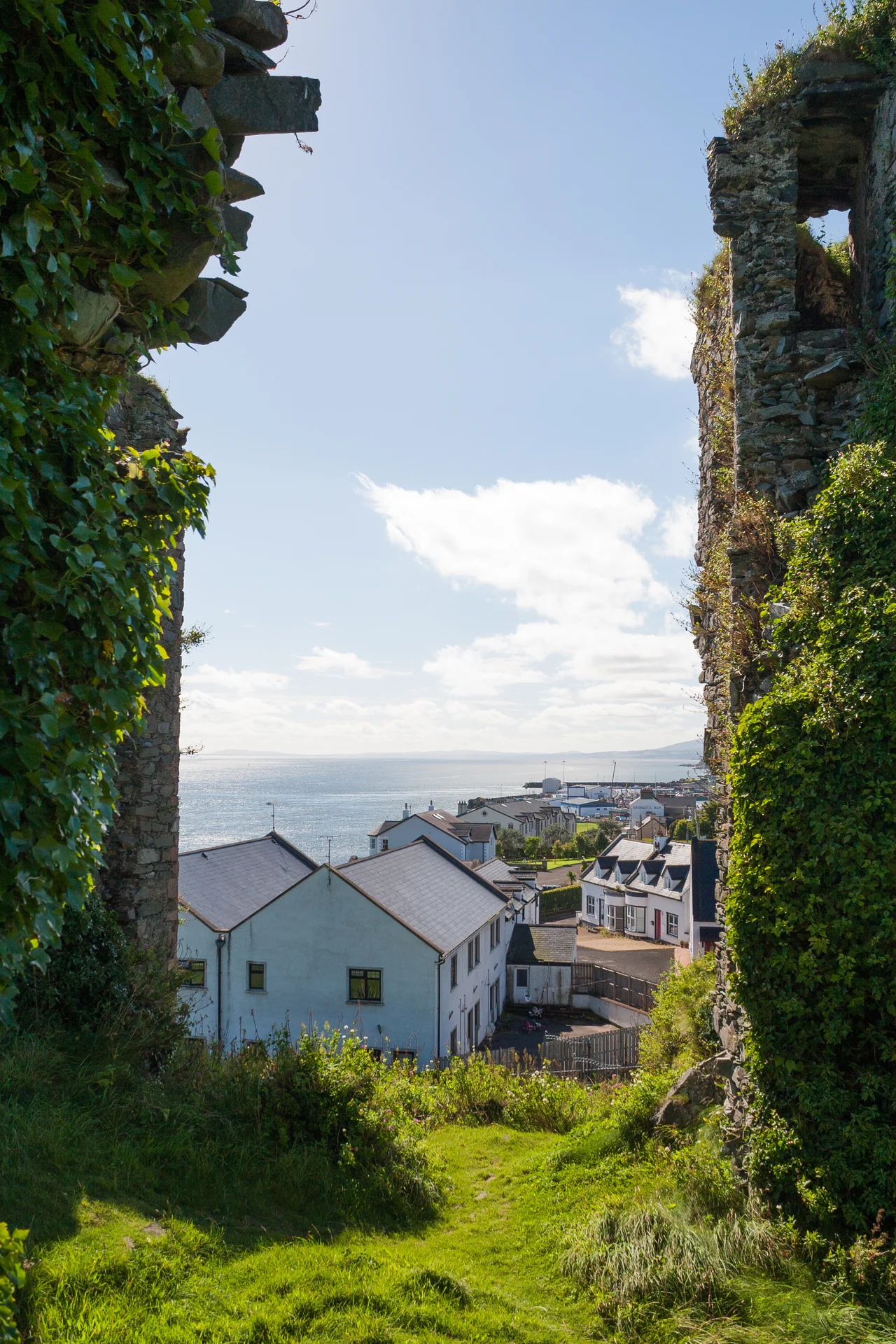 View from the castle down to Greencastle town and Lough Foyle, looking west.