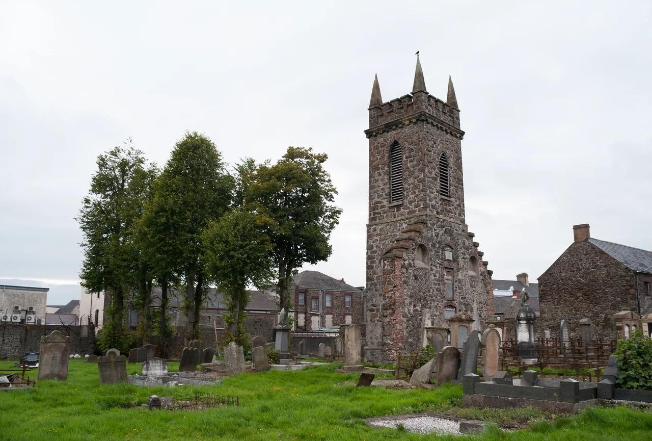 South-east view of the surviving tower of the former parish church at Church Street. Listed as B2 building.