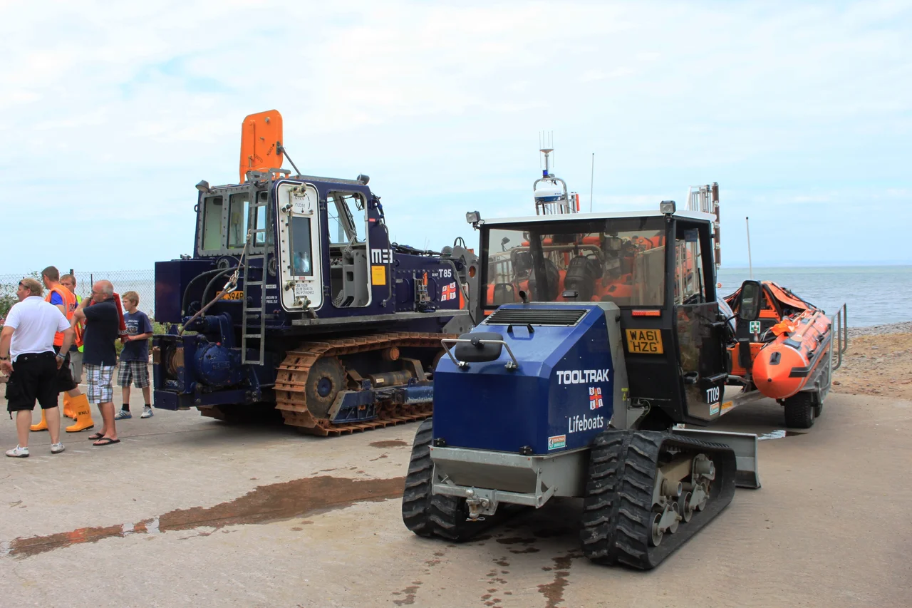 The two tractors used for launching the Minehead lifeboats. On the left is T85, a Case 1150B which works with the B Class boat; on the right is TT09, a Tooltrack which works with the smaller  D Class boat.