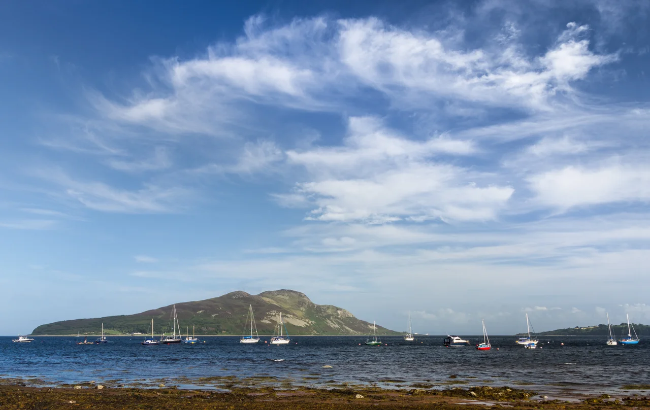 The Holy Isle sits in the middle of Lamlash bay, making it a safe natural harbour for yachts.