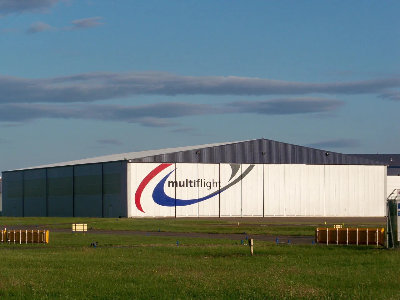A hangar owned by Multiflight, flight training school, situated at Leeds Bradford International Airport, Leeds, West Yorkshire, UK. July 2009.