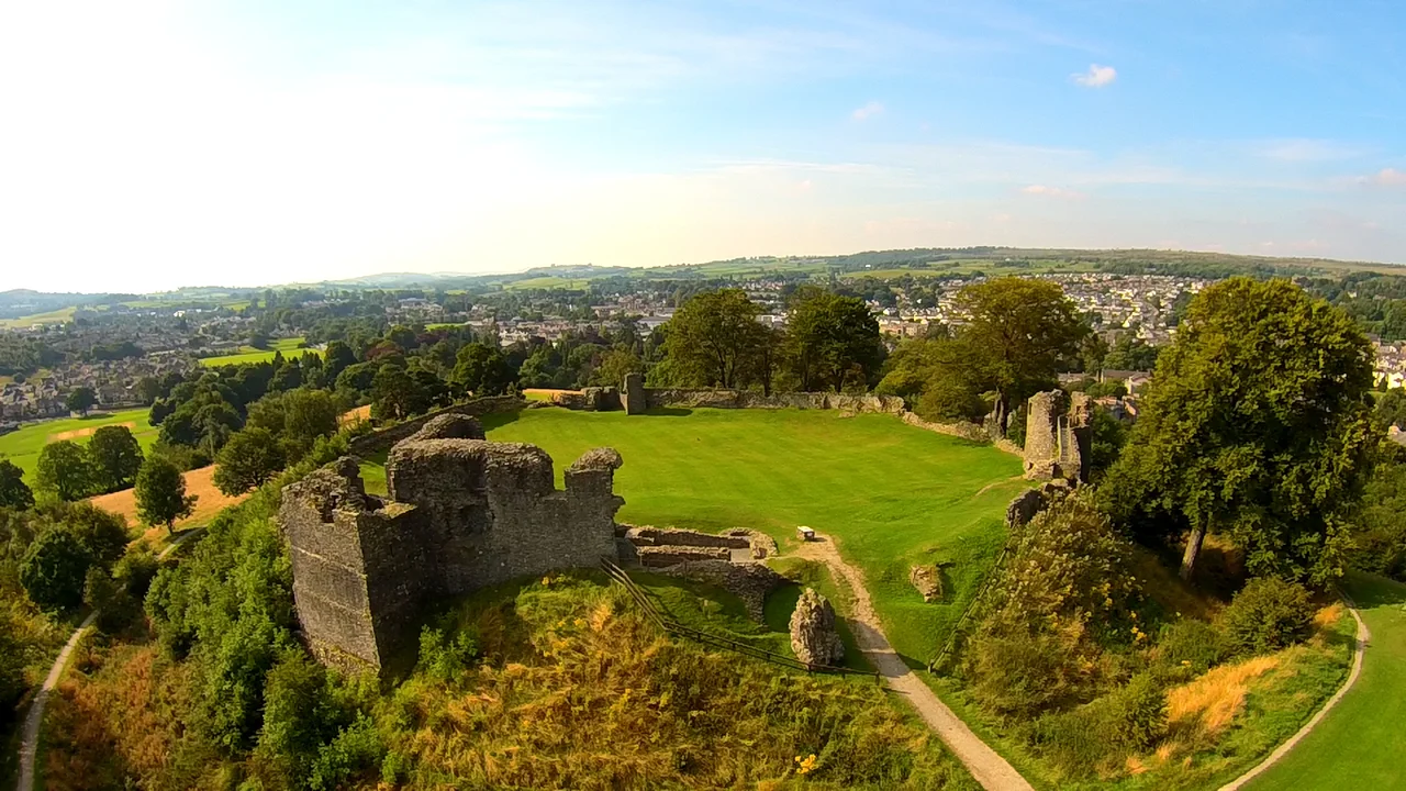 Aerial view of Kendal Castle looking south. The town of Kendal is visible behind.