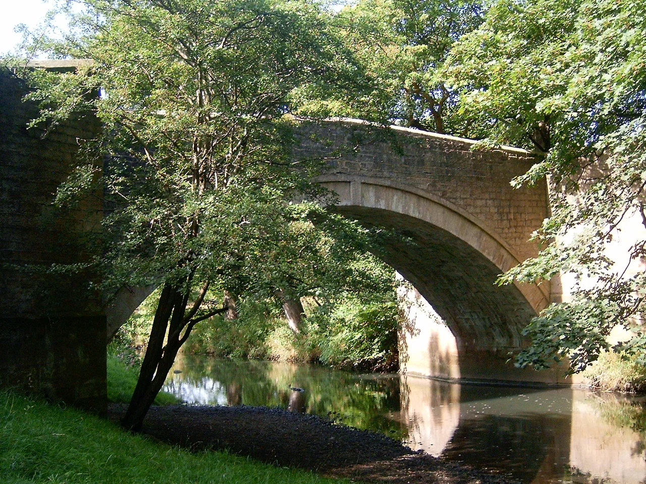 The en:River Gaunless in the grounds of en:Auckland Castle, a short distance before it merges with the en:River Wear