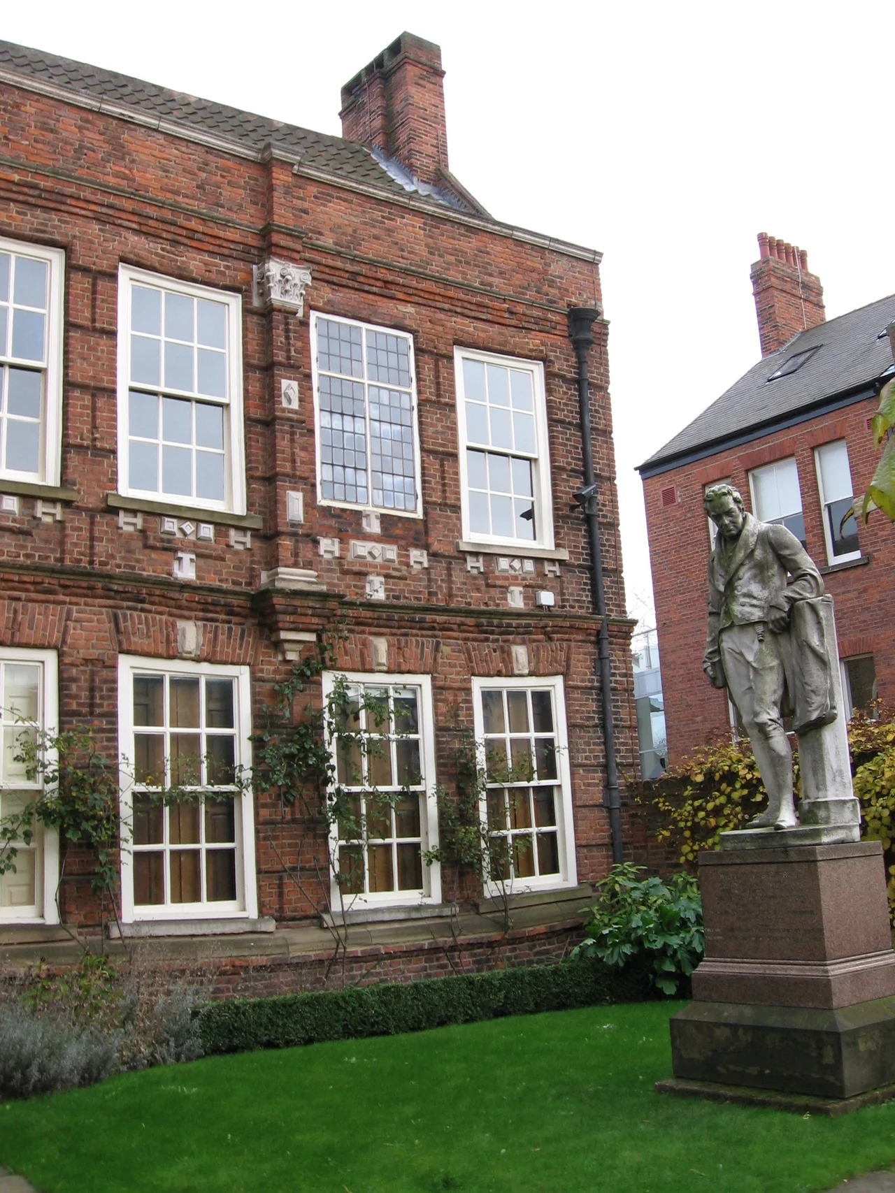 A statue of William Wilberforce, located outside Wilberforce House, High Street, Hull, East Riding of Yorkshire, England.