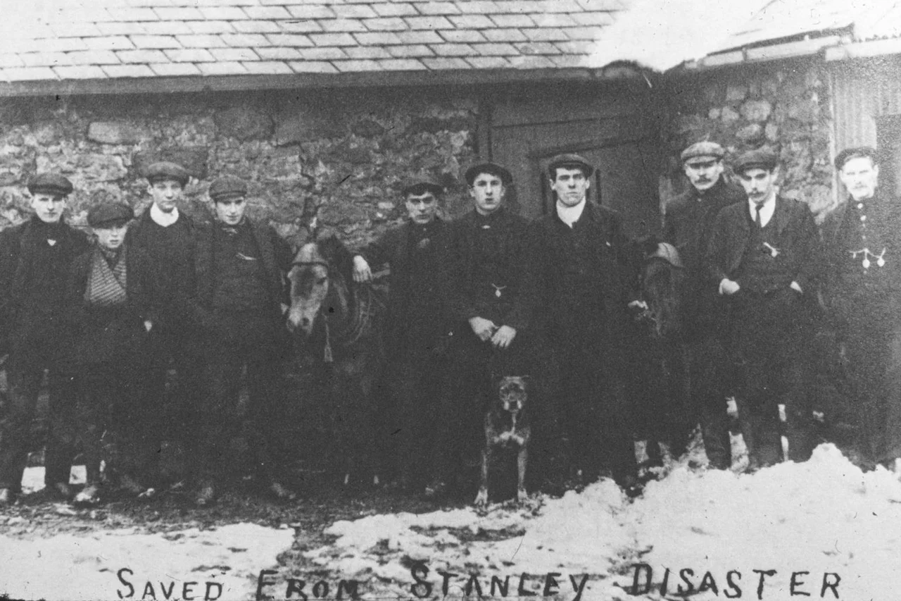 A group of miners and a donkey pose for a photograph after being the only survivors from the West Stanley pit disaster. 168 miners died in the accident.