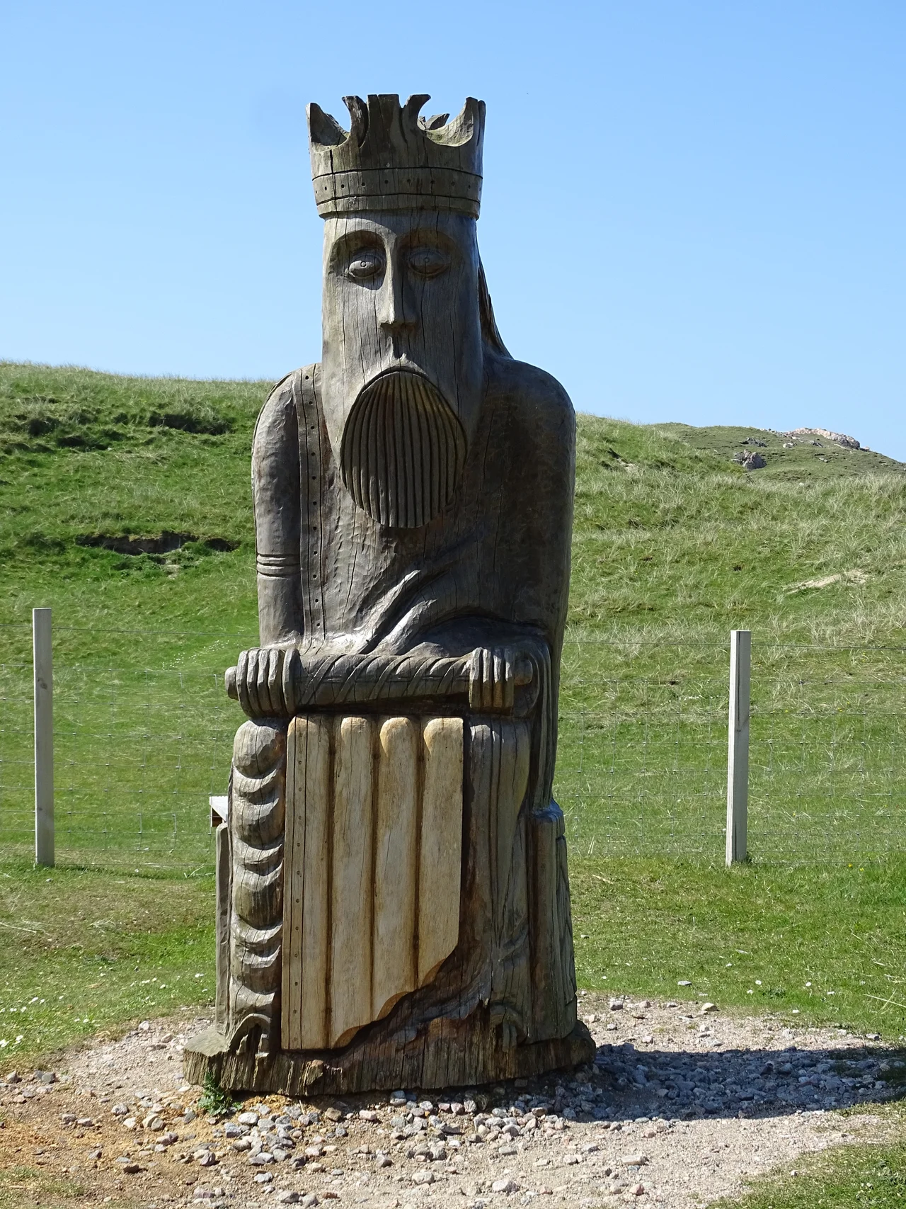 The Uig Chessman sculpture, commissioned in 2006, and carved in oak by Stephen Hayward.