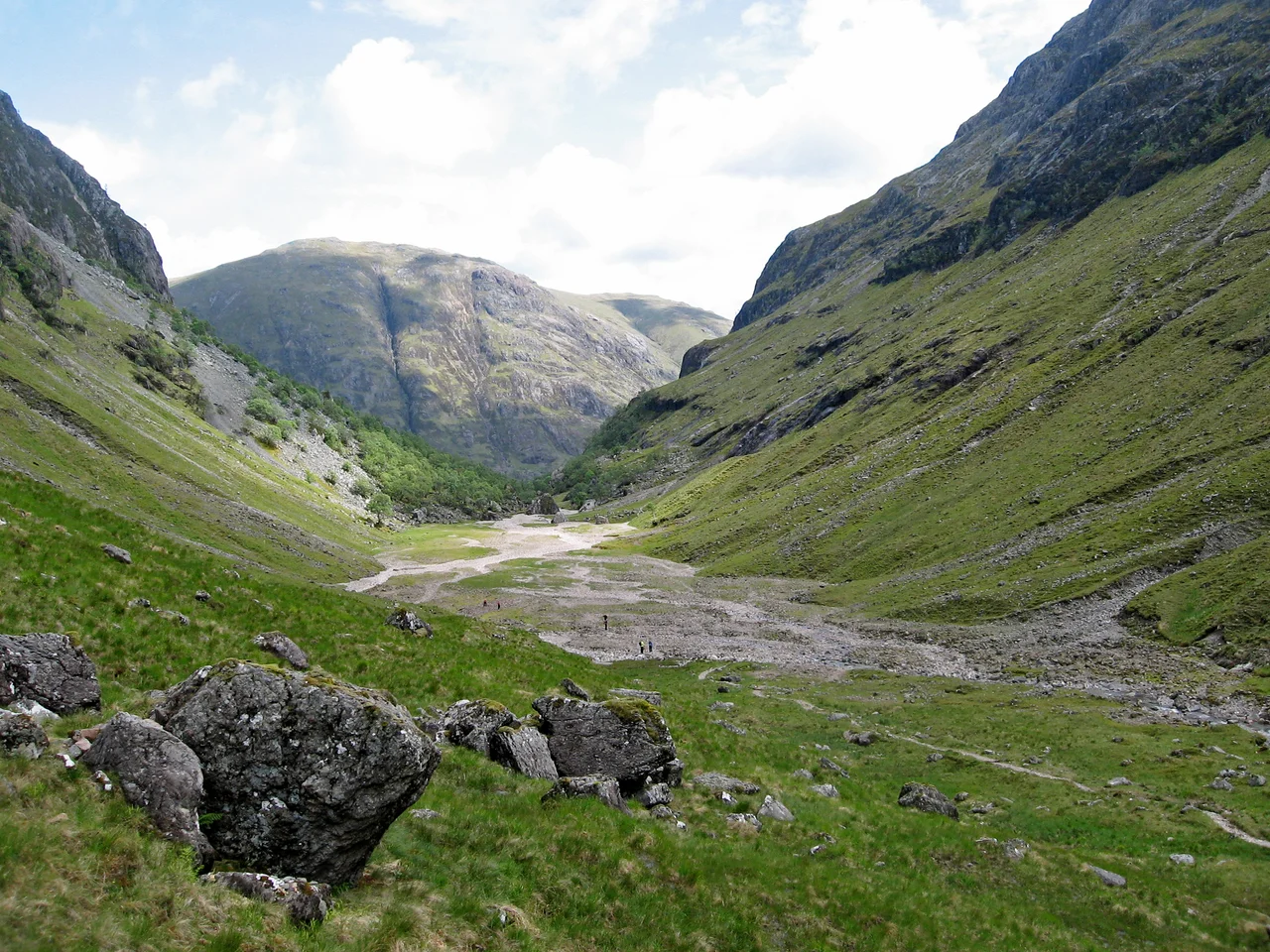 Coire Gabhail, the Lost Valley of Bidean nam Bian in Glen Coe. View north over flat part of valley to the narrow entrance to the Lost Valley, and beyond that the  Aonach Eagach ridge on the other side of Glen Coe.