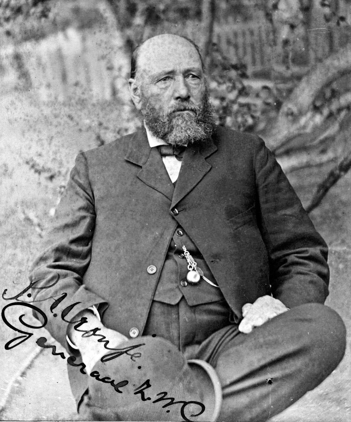 General Piet Cronjé (1836-1911), veteran general of the army of the South African Republic during the Second Boer War, taken prisoner by the British when he surrendered after losing the battle of Paardeberg on 27 February 1900. The photograph shows Cronjé as prisoner of war on Saint Helena where he remained until the conclusion of the war on 31 May 1902. Manuscript on photograph: "P.A. Cronje" / "Generaal Z.W.C".