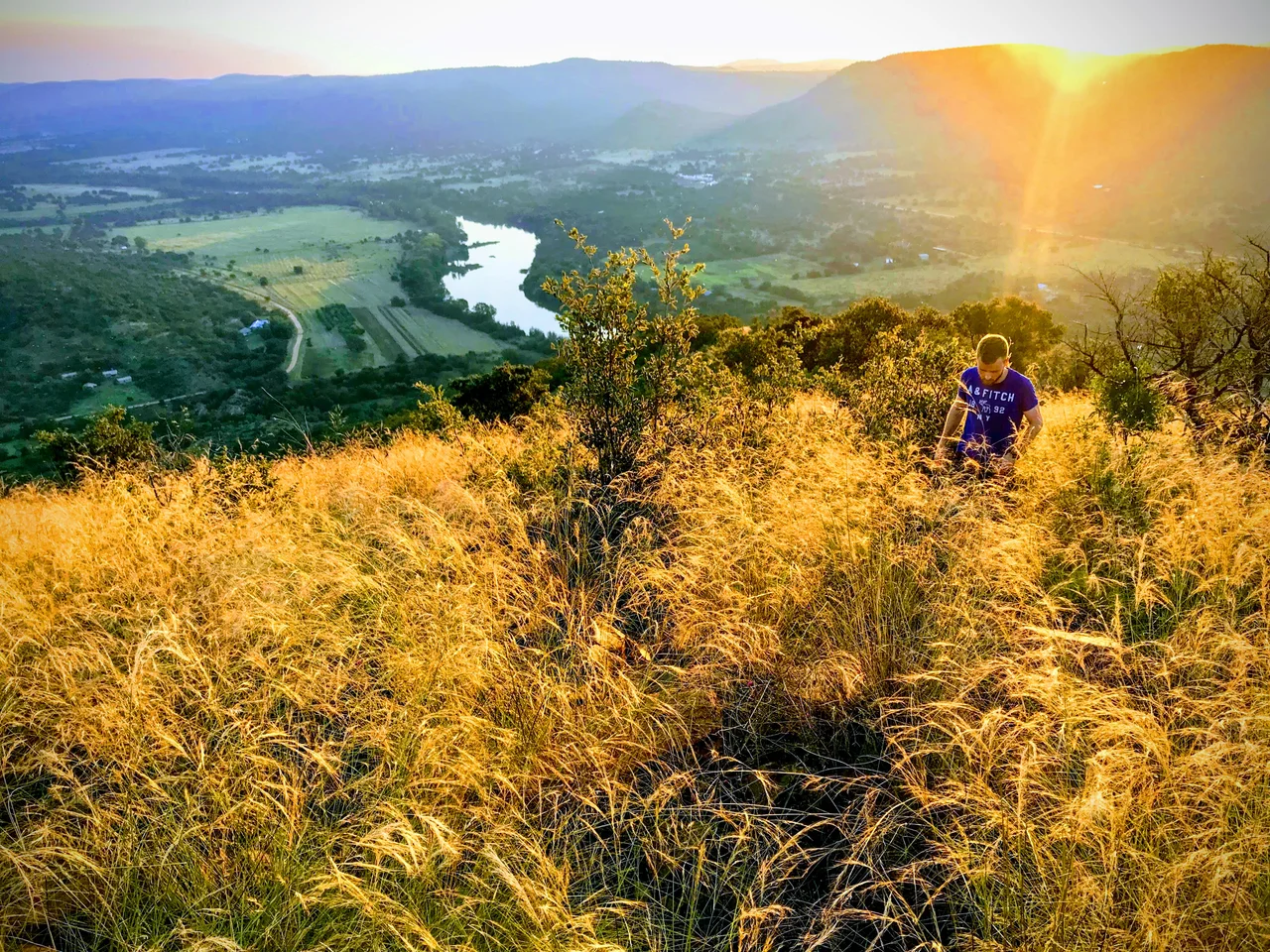 This is the view from the top of Assvoelkop in the heart of the Vredefort Crater with the Vaal River in the distance.
