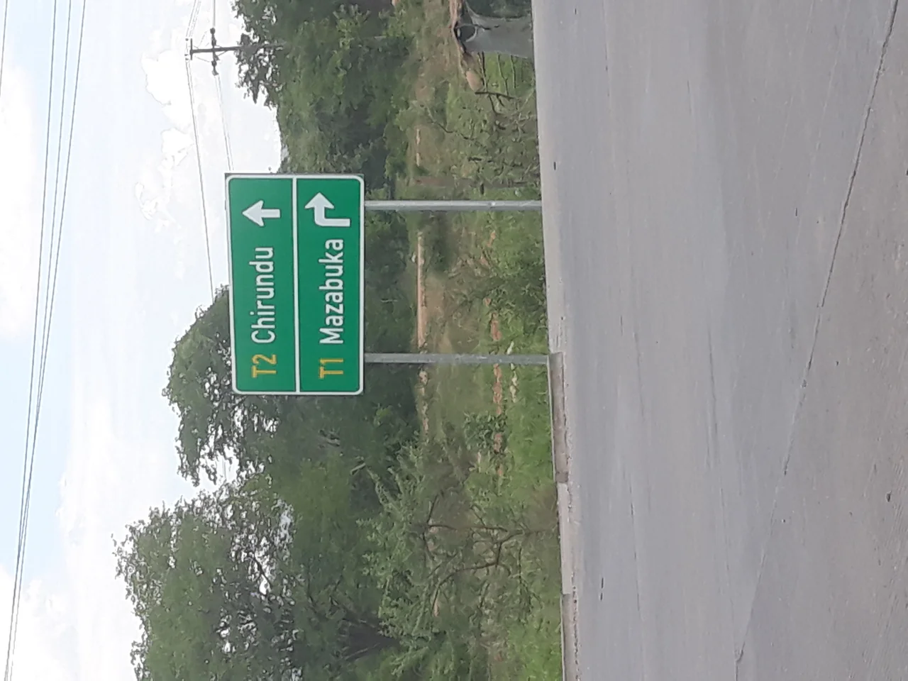 A road sign at the T2 & T1 junction in Chikankata District, Southern Province, Zambia