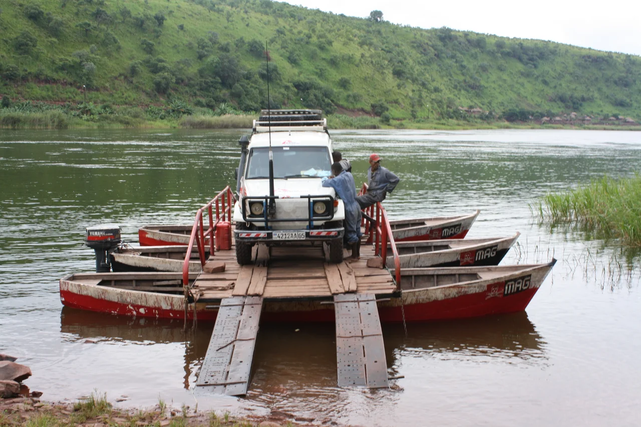 Car being ferried across the Luvua River near Pweto, Katanga, DRC