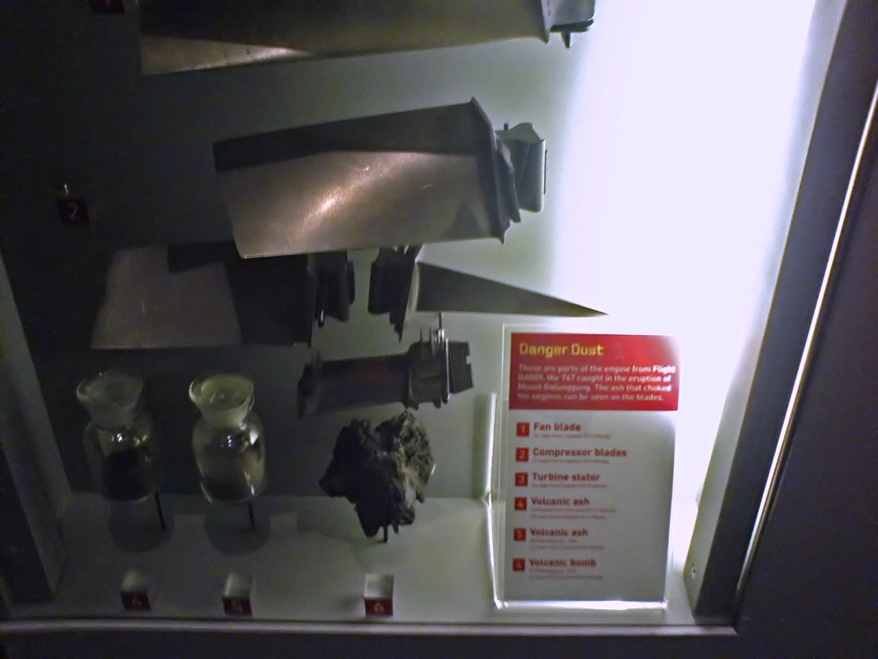 Some elements of the engines from British Airways Flight 9, damaged by volcanic ash (shown at the "Auckland Museum")
Note that these parts were on loan at the Museum and were returned to their owner in 2011, so are no longer on display nor part of the Museum's collection.
Parts (from top):
Fan blade
Compressor blade
Turbine stator