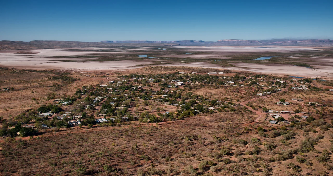 The town of Wyndham,_Western_Australia, looking towards the south with the King River and Cockburn Ranges in the distance.