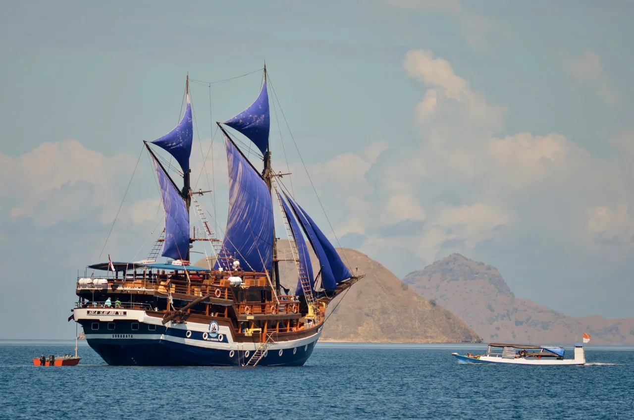 Cruise ship Sea Safari VII anchored off Komodo island while her passengers explore the area.