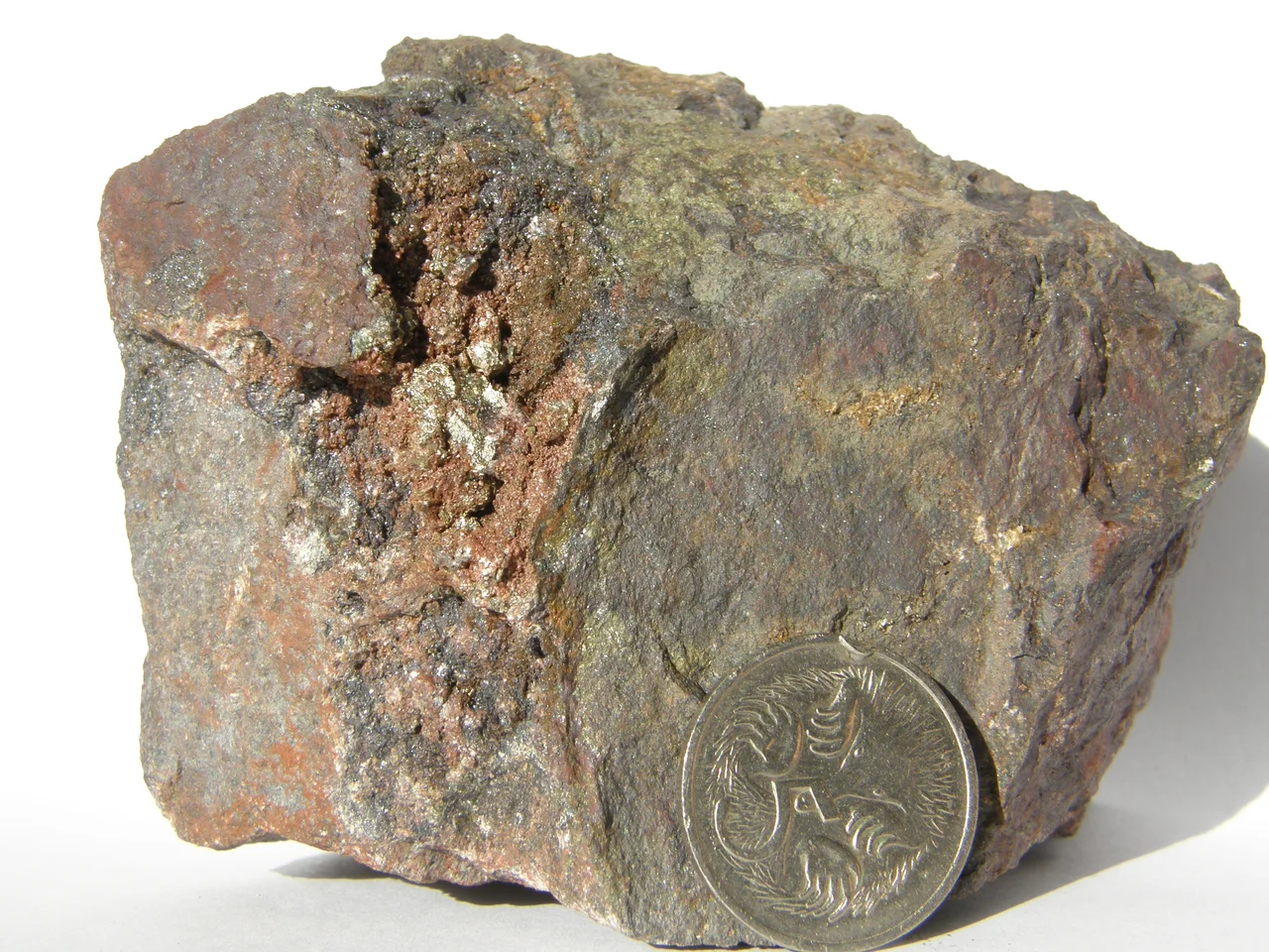Chalcopyrite in hematised breccia, Prominent Hill, South Australia