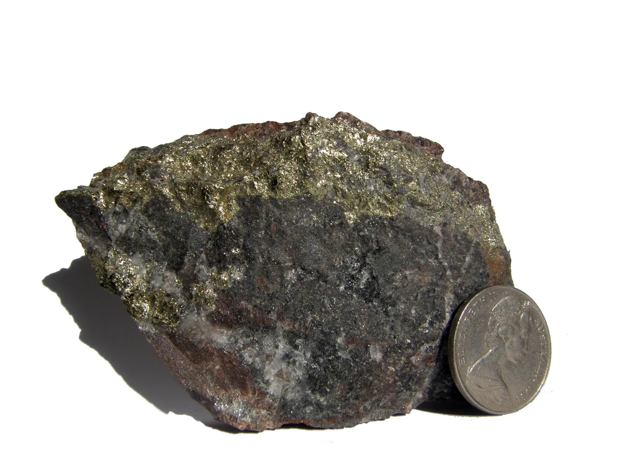 Ore from Olympic Dam: massive chalcopyrite in strongly hematised breccia
