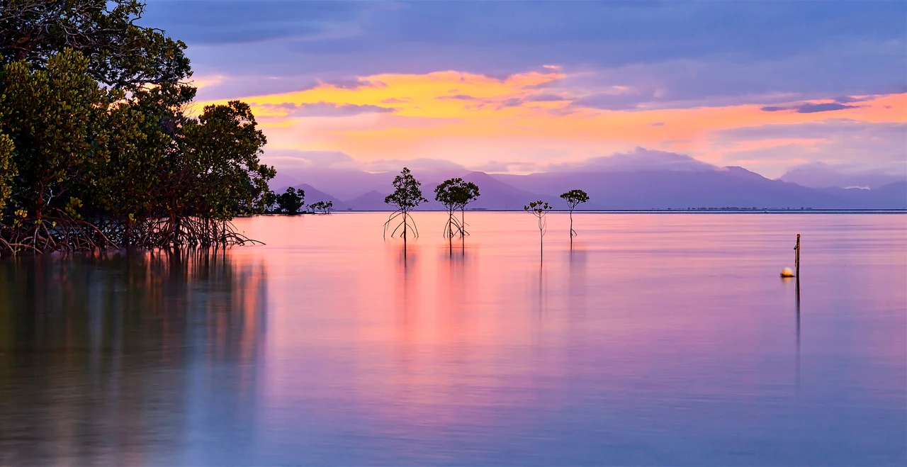 Sunset from the shore on Orpheus Island National Park- James Cook University Research Station.  Orpheus Island is part of the Palm Islands and within the Great Barrier Reef World Heritage Area