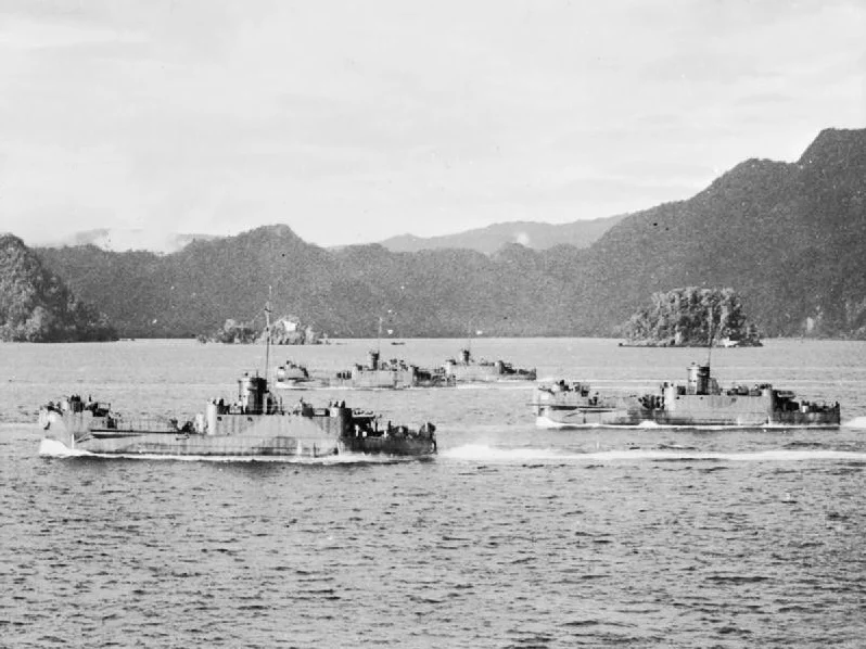 The Campaign in the Dutch East Indies, April - September 1944: American landing craft cross Humboldt Bay during the assault on Hollandia.