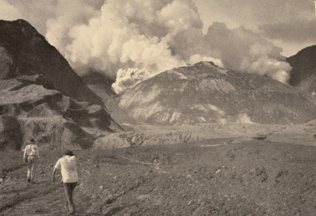 Scientists in Avalanche Valley approach a lava dome in the crater of Mount Lamington in February 1951.