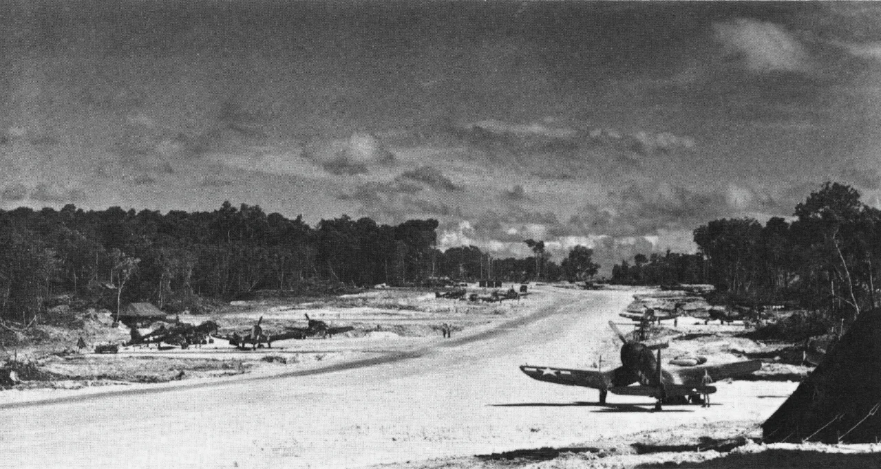 U.S. Marine Corps Vought F4U-1 Corsairs of Marine Air Group 61 (MAG-61) at Emirau in position along a taxiway to the new aifield which was operational less than two months after the landing on 20 March 1944.
